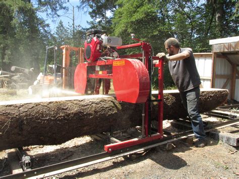 Check out Frontier, woodland mills, You need at least 14hp. . Linn lumber sawmill parts